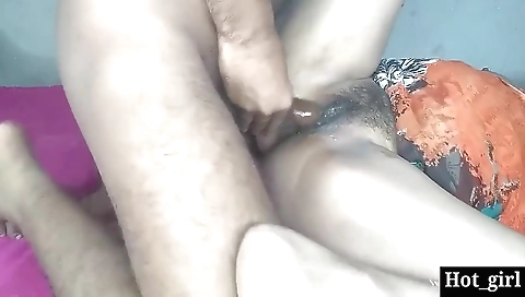 Indian woman fucks her hairy pussy with a big white cock