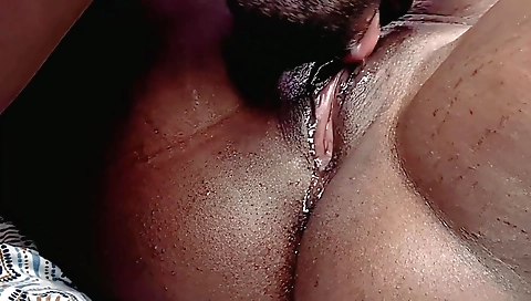 A big ass woman in a lingerie is doing a cunnilingus