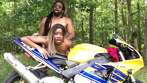 Ebony girl enjoys having sex in the backseat of a car