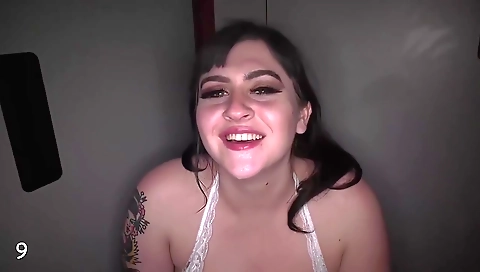 Ebony girl with a tattooed face sucking a big cock