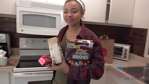 Ebony amateur in red shorts riding cock on the grass