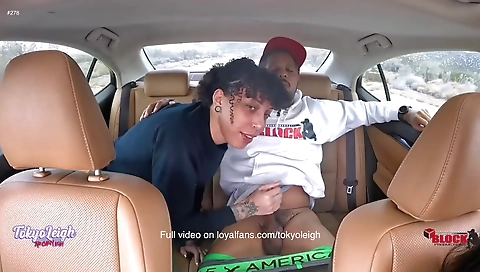 Hot brunette in a car sex show with a real big cock