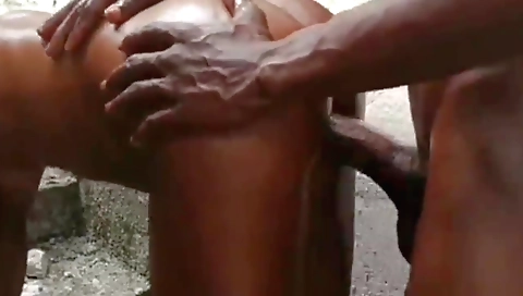 Big black cock is penetrating a ebony teen in her holes