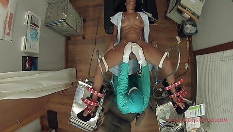 Ebony gets a massage on a massage table from a doctor