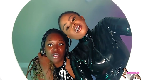 Ebony lesbians show off their big asses and tight ass