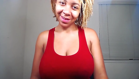 Ebony babe with natural boobs shows off her perfect figure