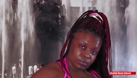 Ebony babe with a tattooed ass fucks her black cock