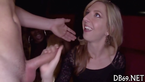 Busty brunette blonde gives a blowjob to a big black cock