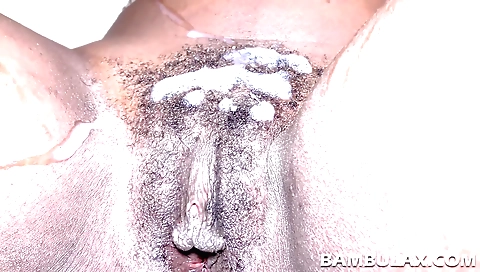 Ebony chick rides a hard cock in a hardcore porn video