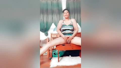 Beautiful ebony brunette self-filming with her pussy