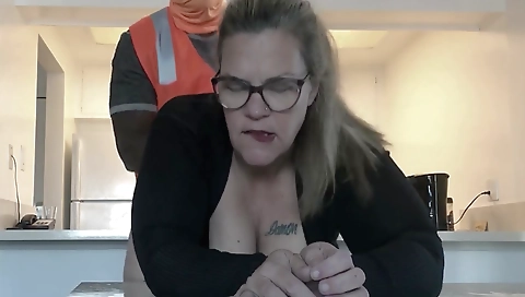 Mature blonde is fucked by a young construction worker