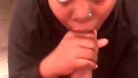 Blonde ebony girl getting a blowjob in a private bathroom