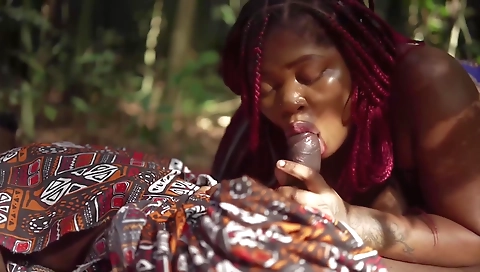 Big booty ebony is having a nice deepthroat sex with a cock