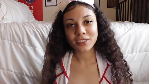 Sexy brunette nurse fucks herself in front of the webcam